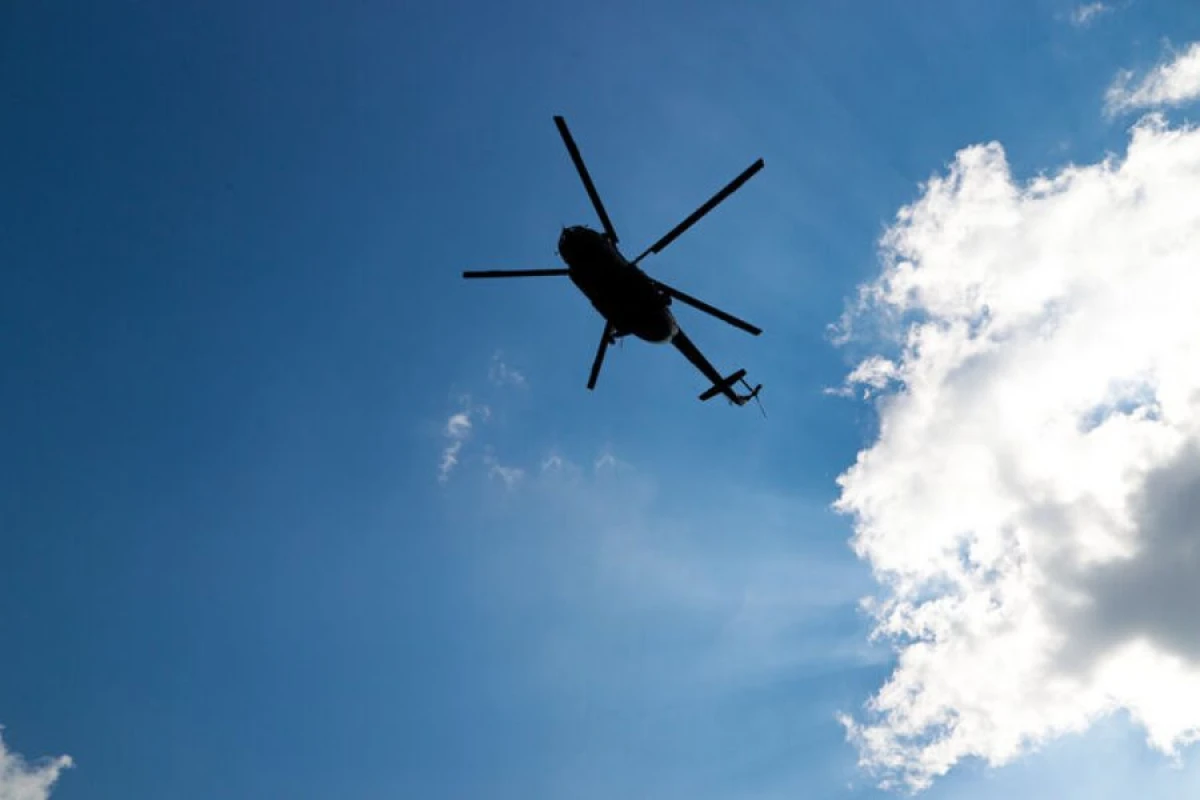 Qırğızıstanda helikopter [[sərt eniş etdi]]