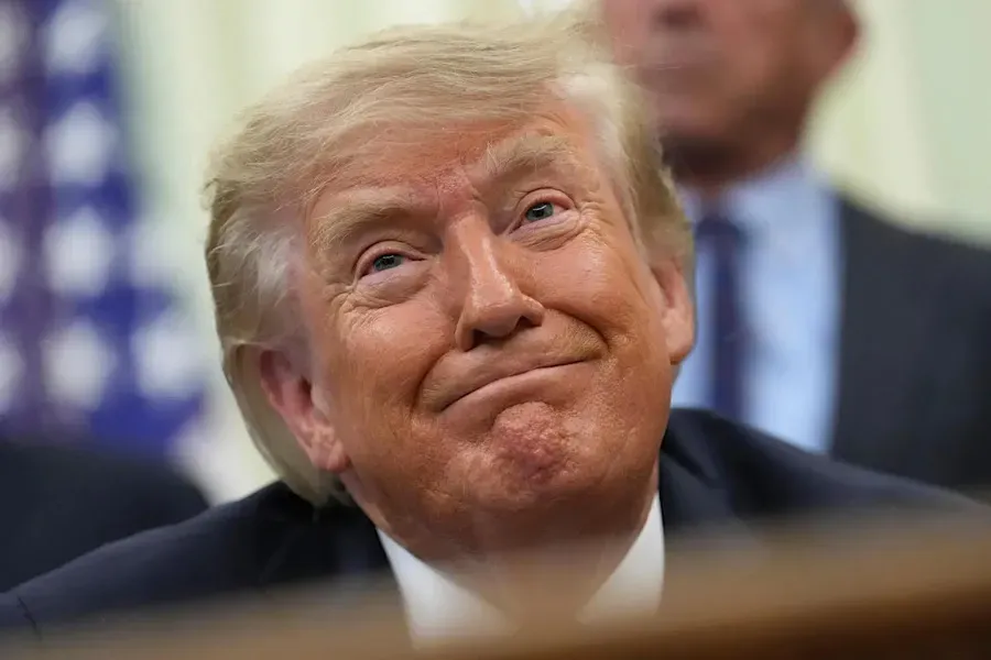 Trump makes remarks seen as exonerating Russia