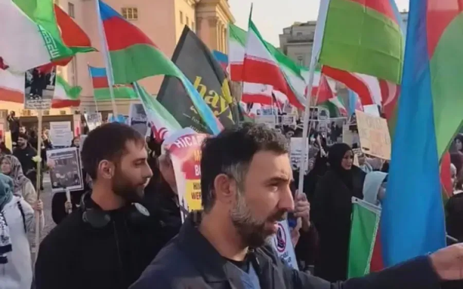 Why are protesters demanding “Freedom for the hijab” in Berlin waving Iranian flags?